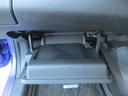車検証ブックや小物などが収納できるスペースがあります。