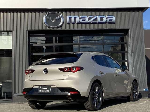 MAZDA3ファストバック 2.0 20S ツーリング 当社試乗車アップ車 ナビSDカード フルセグTVチューナー Bluetooth機能 USB接続端子 ワイヤレス充電Qi ETC 360°ビュー パワーシート シートヒータ パドルシフト Alexa機能(3枚目)