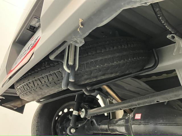 ハイゼットカーゴ ＤＸ　パートタイム４ＷＤ　キーレス　コーナーセンサー　ＥＴＣ　衝突被害軽減ブレーキ　スマアシ　コーナーセンサー　キーレス　前席パワーウインドウ　ＡＭ／ＦＭステレオ　ＥＴＣ　両側スライドドア　パートタイム４ＷＤ　オートライト（31枚目）