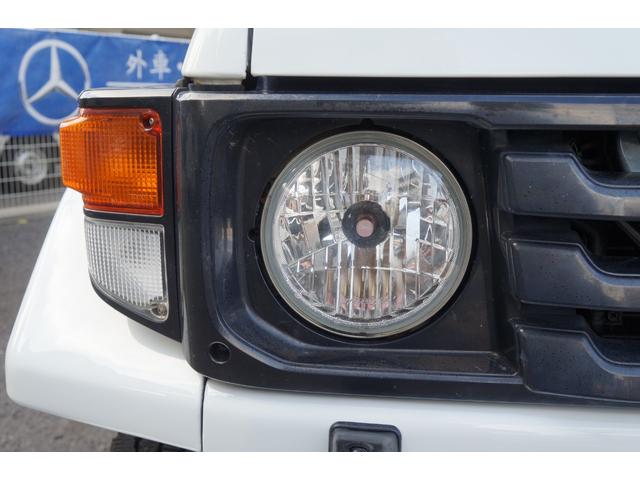 ランドクルーザー70 ZX ワンオーナー チルト&スライディングサンルーフ デフロック 背面スペアタイヤ サイドステップ パワーステアリング パワーウインドー 集中ドアロック チップアップシート マニュアルエアコン リアヒーター(19枚目)