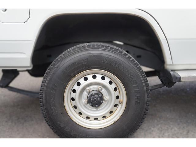 ランドクルーザー70 ZX ワンオーナー チルト&スライディングサンルーフ デフロック 背面スペアタイヤ サイドステップ パワーステアリング パワーウインドー 集中ドアロック チップアップシート マニュアルエアコン リアヒーター(62枚目)