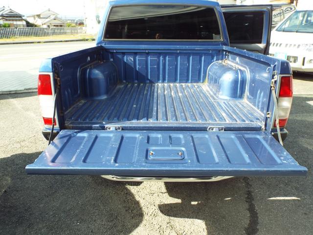 ダットサンピックアップ ダブルキャブ AXリミテッド 3200ccディーゼルエンジン 5速マニュアル車 ジャオスマッドガード(14枚目)