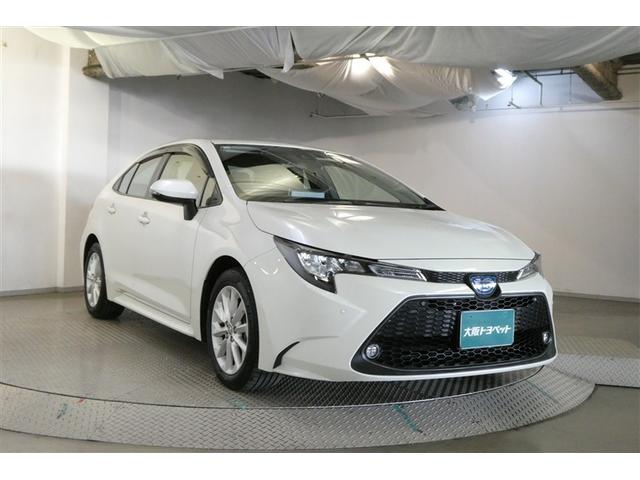 カローラ ハイブリッド　Ｓ　スマートキ　横滑り防止機能　ＬＥＤヘッドライト　ミュージックプレイヤー接続可　盗難防止装置　ＤＶＤ再生　キーレス　オートエアコン　クルコン　リヤカメラ　メモリナビ　フルセグ　パワーステアリング　ＡＷ（3枚目）