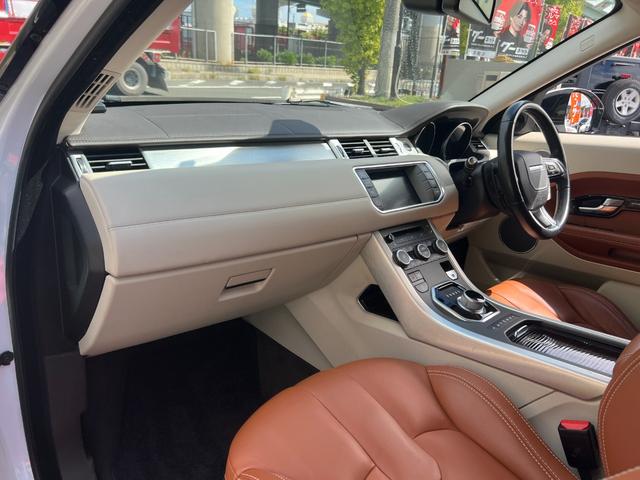 レンジローバーイヴォーク プレステージ　パノラマガラスルーフ　レザーシート　ナビ　Ｂｌｕｅｔｏｏｔｈ　ＥＴＣ　バックカメラ　パワートランク　シートヒータ　パワーシート　ＦＲコーナーセンサー　クルコン　ステアリングヒーター　スマキー　１９ＡＷ（24枚目）