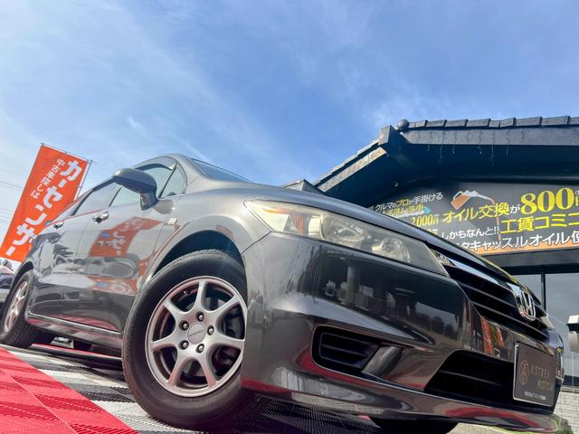 ストリーム X特別仕様車 HDDナビエディション HDDインターナビ バックカメラ ETC デジタルインナーミラー 3列シート 7人乗り スマートキー ステアリングスイッチ オートライト 社外15インチアルミ 電格ミラー HIDヘッドライト(7枚目)