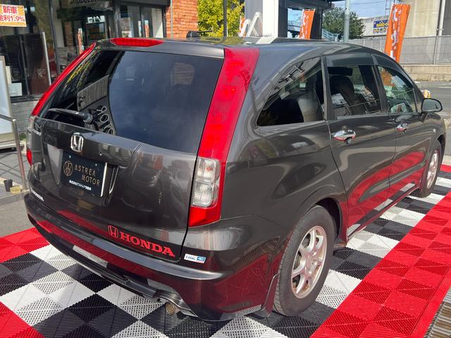 ストリーム X特別仕様車 HDDナビエディション HDDインターナビ バックカメラ ETC デジタルインナーミラー 3列シート 7人乗り スマートキー ステアリングスイッチ オートライト 社外15インチアルミ 電格ミラー HIDヘッドライト(9枚目)