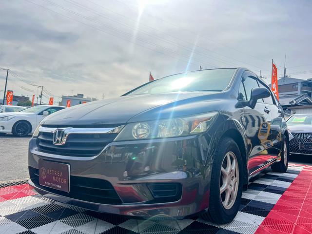 ストリーム X特別仕様車 HDDナビエディション HDDインターナビ バックカメラ ETC デジタルインナーミラー 3列シート 7人乗り スマートキー ステアリングスイッチ オートライト 社外15インチアルミ 電格ミラー HIDヘッドライト(13枚目)