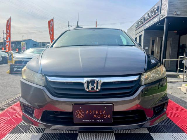 ストリーム X特別仕様車 HDDナビエディション HDDインターナビ バックカメラ ETC デジタルインナーミラー 3列シート 7人乗り スマートキー ステアリングスイッチ オートライト 社外15インチアルミ 電格ミラー HIDヘッドライト(14枚目)