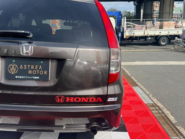 ストリーム X特別仕様車 HDDナビエディション HDDインターナビ バックカメラ ETC デジタルインナーミラー 3列シート 7人乗り スマートキー ステアリングスイッチ オートライト 社外15インチアルミ 電格ミラー HIDヘッドライト(19枚目)