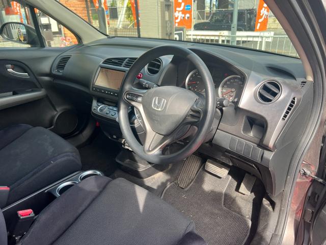 ストリーム X特別仕様車 HDDナビエディション HDDインターナビ バックカメラ ETC デジタルインナーミラー 3列シート 7人乗り スマートキー ステアリングスイッチ オートライト 社外15インチアルミ 電格ミラー HIDヘッドライト(23枚目)