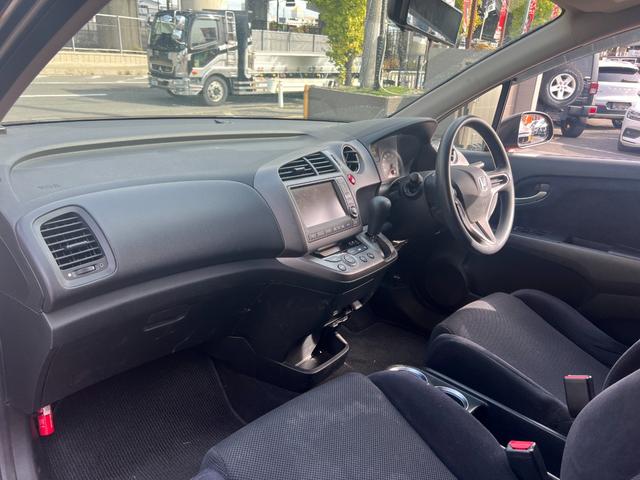 ストリーム X特別仕様車 HDDナビエディション HDDインターナビ バックカメラ ETC デジタルインナーミラー 3列シート 7人乗り スマートキー ステアリングスイッチ オートライト 社外15インチアルミ 電格ミラー HIDヘッドライト(24枚目)