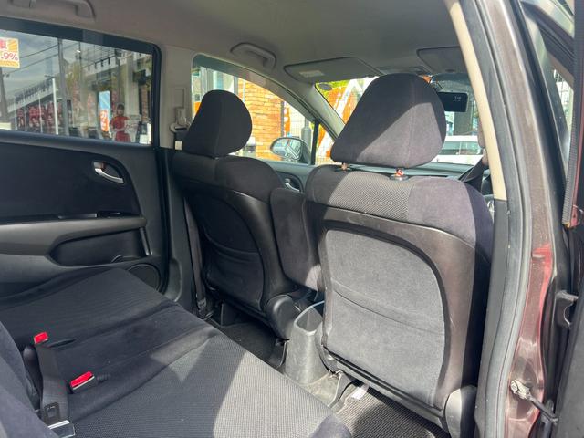 ストリーム X特別仕様車 HDDナビエディション HDDインターナビ バックカメラ ETC デジタルインナーミラー 3列シート 7人乗り スマートキー ステアリングスイッチ オートライト 社外15インチアルミ 電格ミラー HIDヘッドライト(27枚目)