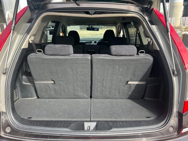 ストリーム X特別仕様車 HDDナビエディション HDDインターナビ バックカメラ ETC デジタルインナーミラー 3列シート 7人乗り スマートキー ステアリングスイッチ オートライト 社外15インチアルミ 電格ミラー HIDヘッドライト(31枚目)