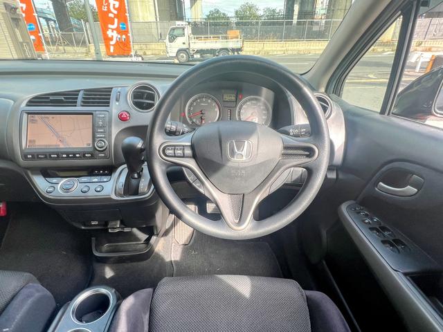 ストリーム X特別仕様車 HDDナビエディション HDDインターナビ バックカメラ ETC デジタルインナーミラー 3列シート 7人乗り スマートキー ステアリングスイッチ オートライト 社外15インチアルミ 電格ミラー HIDヘッドライト(37枚目)