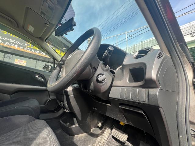 ストリーム X特別仕様車 HDDナビエディション HDDインターナビ バックカメラ ETC デジタルインナーミラー 3列シート 7人乗り スマートキー ステアリングスイッチ オートライト 社外15インチアルミ 電格ミラー HIDヘッドライト(48枚目)