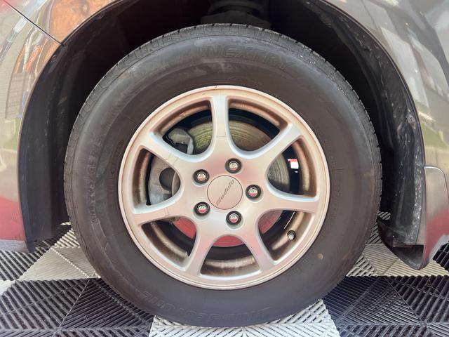 ストリーム X特別仕様車 HDDナビエディション HDDインターナビ バックカメラ ETC デジタルインナーミラー 3列シート 7人乗り スマートキー ステアリングスイッチ オートライト 社外15インチアルミ 電格ミラー HIDヘッドライト(64枚目)