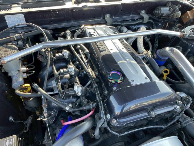 １８０ＳＸ 　同色全塗装／社外エアロ（Ｆ・Ｓ・Ｒ）／社外リアフェンダー・フロントフェンダー／社外ＩＣ／ｅｖｏｌｕｔｉｏｎ　インテンシブハンク　１８ＡＷ／社外エアクリーナー／社外アルミリザーブタンク／社外車高調（66枚目）