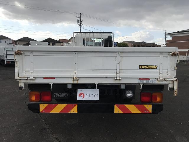 ヒノレンジャー 4t積・6MT・6200平ボディ・アシストゲート 6200ボディ・6MT・4t積・左電格ミラー・ロープ穴4対・ETC・フォグライト・荷台内寸 L6212 W2147 H398・灰皿1つ欠・看板消し跡・キャビン・荷台 キズ、サビ、凹み有り(7枚目)