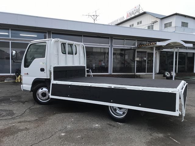 エルフトラック ２ｔ積・平ボディ・１０尺・５ｔ未満・荷台鉄板張・５ＭＴ　２ｔ積・平ボディ・１０尺・５ｔ未満・荷台鉄板張・５ＭＴ・坂道発進補助装置・左電格ミラー・３ペダル・荷台内寸　Ｌ３１３９　Ｗ１６２６　Ｈ３８１（13枚目）