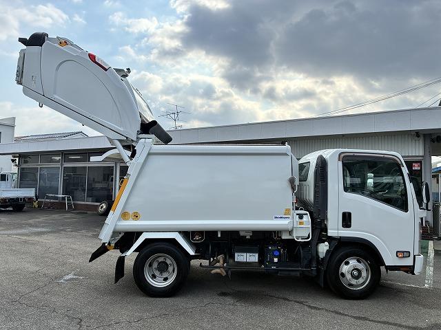 エルフトラック 新明和Ｇ－ＰＸプレス式パッカー・塵芥車・６立米　新明和Ｇ－ＰＸ（ＧＴ０６４）・６立米・プレス式・連続スイッチ・汚水タンク・Ｂモニター・坂道発進補助装置・左電格ミラー・キーレス（12枚目）