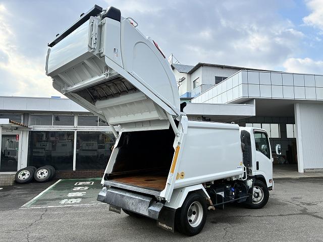 エルフトラック 新明和Ｇ－ＰＸプレス式パッカー・塵芥車・６立米　新明和Ｇ－ＰＸ（ＧＴ０６４）・６立米・プレス式・連続スイッチ・汚水タンク・Ｂモニター・坂道発進補助装置・左電格ミラー・キーレス（15枚目）
