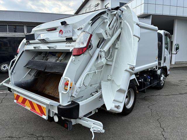 エルフトラック 新明和Ｇ－ＰＸプレス式パッカー・塵芥車・６立米　新明和Ｇ－ＰＸ（ＧＴ０６４）・６立米・プレス式・連続スイッチ・汚水タンク・Ｂモニター・坂道発進補助装置・左電格ミラー・キーレス（18枚目）