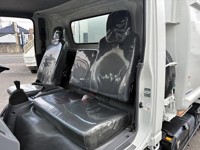 エルフトラック 新明和Ｇ－ＰＸプレス式パッカー・塵芥車・６立米　新明和Ｇ－ＰＸ（ＧＴ０６４）・６立米・プレス式・連続スイッチ・汚水タンク・Ｂモニター・坂道発進補助装置・左電格ミラー・キーレス（24枚目）