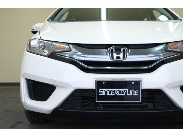 フィットハイブリッド Ｆパッケージ　・ＬＥＤヘッドライト・純正１５インチホイール・純正７インチナビ・ＴＶ・バックカメラ・Ｂｌｕｅｔｏｏｔｈ・スマートキー・プッシュスタート（24枚目）