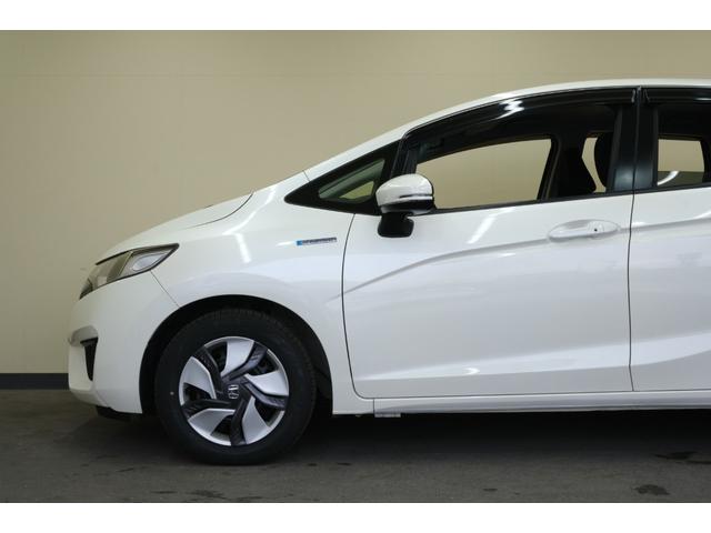 フィットハイブリッド Ｆパッケージ　・ＬＥＤヘッドライト・純正１５インチホイール・純正７インチナビ・ＴＶ・バックカメラ・Ｂｌｕｅｔｏｏｔｈ・スマートキー・プッシュスタート（31枚目）
