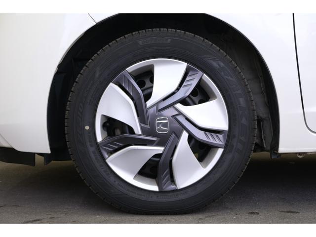 フィットハイブリッド Ｆパッケージ　・ＬＥＤヘッドライト・純正１５インチホイール・純正７インチナビ・ＴＶ・バックカメラ・Ｂｌｕｅｔｏｏｔｈ・スマートキー・プッシュスタート（32枚目）