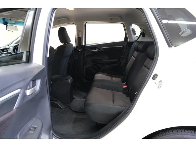 フィットハイブリッド Ｆパッケージ　・ＬＥＤヘッドライト・純正１５インチホイール・純正７インチナビ・ＴＶ・バックカメラ・Ｂｌｕｅｔｏｏｔｈ・スマートキー・プッシュスタート（64枚目）