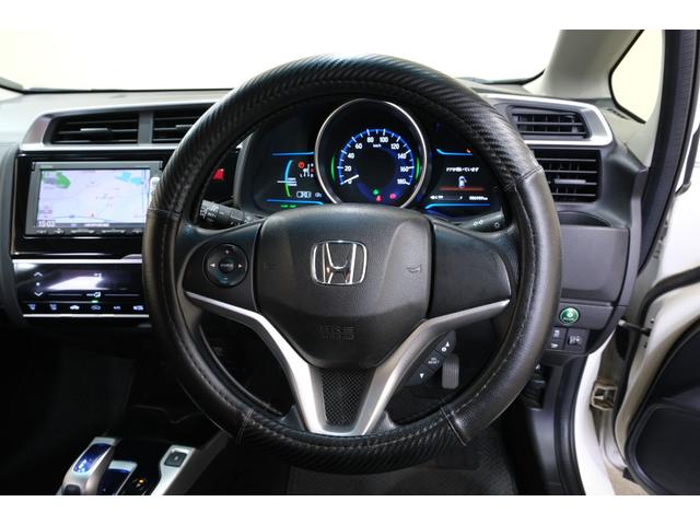 フィットハイブリッド Ｆパッケージ　・ＬＥＤヘッドライト・純正１５インチホイール・純正７インチナビ・ＴＶ・バックカメラ・Ｂｌｕｅｔｏｏｔｈ・スマートキー・プッシュスタート（66枚目）