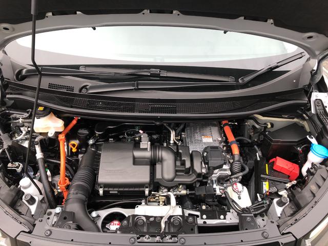 フリード ｅ：ＨＥＶエアー　登録済未使用車　バックカメラ　クリアランスソナー　オートクルーズコントロール　レーンアシスト　衝突被害軽減システム　両側電動スライドドア　オートライト　ＬＥＤヘッドランプ　電動格納ミラー　３列シート（19枚目）