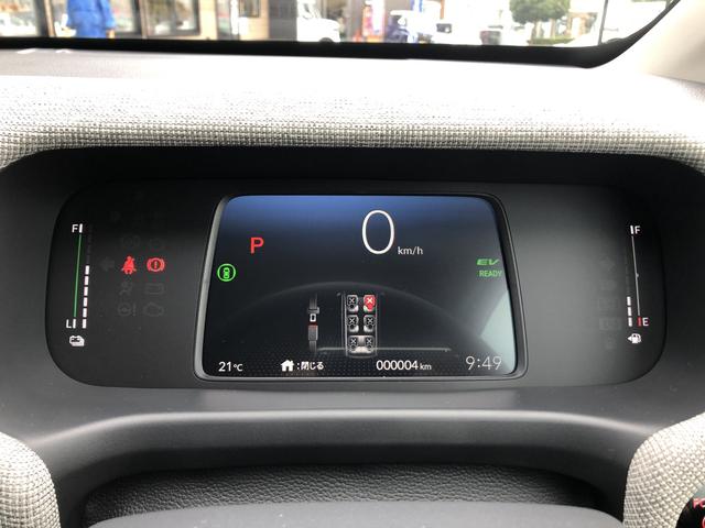フリード ｅ：ＨＥＶエアー　登録済未使用車　バックカメラ　クリアランスソナー　オートクルーズコントロール　レーンアシスト　衝突被害軽減システム　両側電動スライドドア　オートライト　ＬＥＤヘッドランプ　電動格納ミラー　３列シート（24枚目）