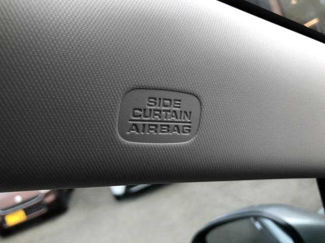 フリード ｅ：ＨＥＶエアー　登録済未使用車　バックカメラ　クリアランスソナー　オートクルーズコントロール　レーンアシスト　衝突被害軽減システム　両側電動スライドドア　オートライト　ＬＥＤヘッドランプ　電動格納ミラー　３列シート（33枚目）