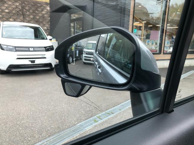 フリード ｅ：ＨＥＶエアー　登録済未使用車　バックカメラ　クリアランスソナー　オートクルーズコントロール　レーンアシスト　衝突被害軽減システム　両側電動スライドドア　オートライト　ＬＥＤヘッドランプ　電動格納ミラー　３列シート（41枚目）