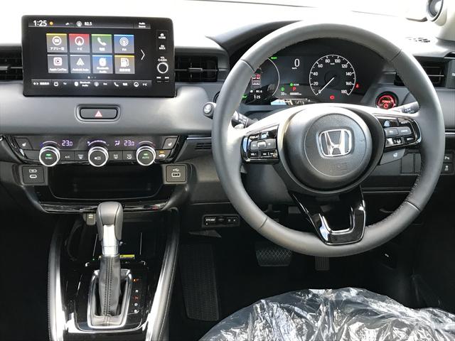 ヴェゼル ｅ：ＨＥＶ　Ｚ　全周囲カメラ　クリアランスソナー　オートクルーズコントロール　レーンアシスト　衝突被害軽減システム　ナビ　オートライト　ＬＥＤヘッドランプ　アルミホイール　スマートキー　電動格納ミラー　シートヒーター（3枚目）