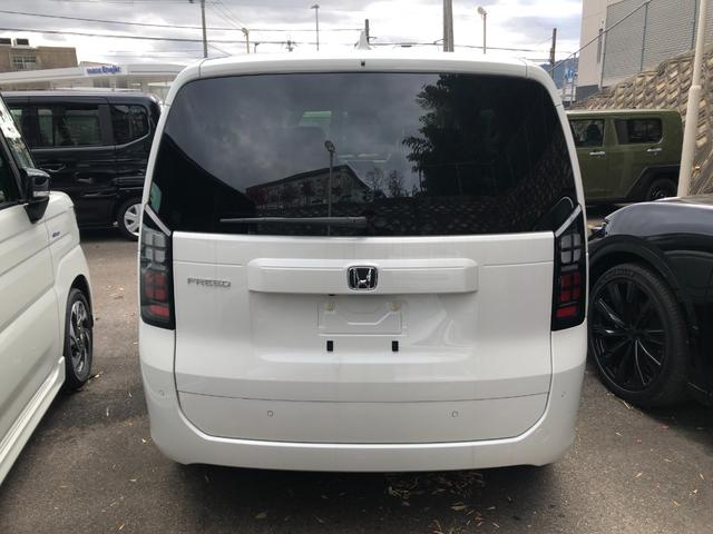 フリード エアー　ＥＸ　クリアランスソナー　オートクルーズコントロール　レーンアシスト　衝突被害軽減システム　両側電動スライドドア　オートライト　ＬＥＤヘッドランプ　スマートキー　電動格納ミラー　シートヒーター　３列シート（9枚目）