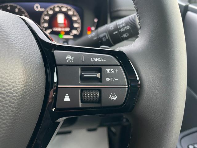 ステップワゴン スパーダ　クリアランスソナー　オートクルーズコントロール　レーンアシスト　衝突被害軽減システム　両側電動スライドドア　オートライト　ＬＥＤヘッドランプ　電動リアゲート　スマートキー　シートヒーター　３列シート（13枚目）