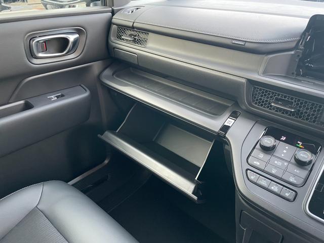 ステップワゴン スパーダ　クリアランスソナー　オートクルーズコントロール　レーンアシスト　衝突被害軽減システム　両側電動スライドドア　オートライト　ＬＥＤヘッドランプ　電動リアゲート　スマートキー　シートヒーター　３列シート（49枚目）