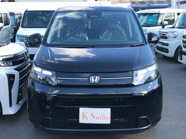 フリード エアー　ＥＸ　クリアランスソナー　オートクルーズコントロール　衝突被害軽減システム　両側電動スライドドア　オートライト　ＬＥＤヘッドランプ　スマートキー　電動格納ミラー　シートヒーター　３列シート　ウォークスルー（17枚目）