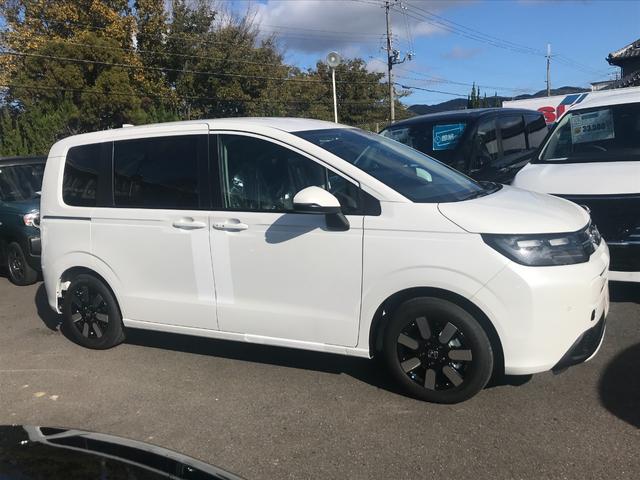 フリード エアー　ＥＸ　クリアランスソナー　オートクルーズコントロール　衝突被害軽減システム　両側電動スライドドア　オートライト　ＬＥＤヘッドランプ　スマートキー　電動格納ミラー　シートヒーター　３列シート　ウォークスルー（19枚目）