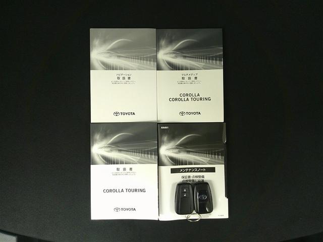 カローラツーリング ハイブリッド ダブルバイビー 追突軽減ブレーキ バックモニタ 横滑防止 スマキー LEDライト デュアルエアバッグ エアコン オートクルーズ サイドエアバッグ ETC付 ナビ PS キーフリー ABS エアバック メモリ-ナビ(29枚目)