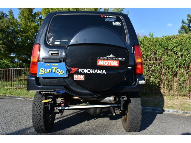 ジムニー ランドベンチャー　前オーナー様大阪府　禁煙車　５ＭＴ　シートヒーター　リフトアップ　社外マフラー　前後バンパーショート加工　車検対応（26枚目）