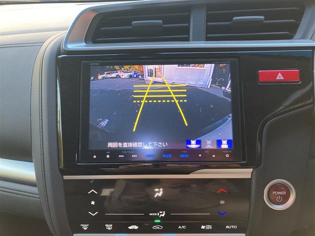 フィットハイブリッド Ｌパッケージ　ハイブリッド　ＥＴＣ　バックカメラ　ナビ　ＴＶ　オートクルーズコントロール　オートライト　ＬＥＤヘッドランプ　スマートキー　電動格納ミラー　ＡＴ　盗難防止システム　衝突安全ボディ　ＵＳＢ　ＡＢＳ（4枚目）