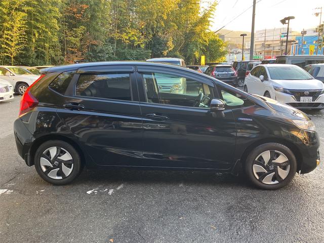 フィットハイブリッド Ｌパッケージ　ハイブリッド　ＥＴＣ　バックカメラ　ナビ　ＴＶ　オートクルーズコントロール　オートライト　ＬＥＤヘッドランプ　スマートキー　電動格納ミラー　ＡＴ　盗難防止システム　衝突安全ボディ　ＵＳＢ　ＡＢＳ（14枚目）