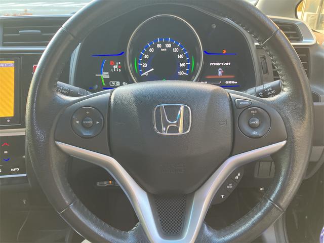 フィットハイブリッド Ｌパッケージ　ハイブリッド　ＥＴＣ　バックカメラ　ナビ　ＴＶ　オートクルーズコントロール　オートライト　ＬＥＤヘッドランプ　スマートキー　電動格納ミラー　ＡＴ　盗難防止システム　衝突安全ボディ　ＵＳＢ　ＡＢＳ（30枚目）