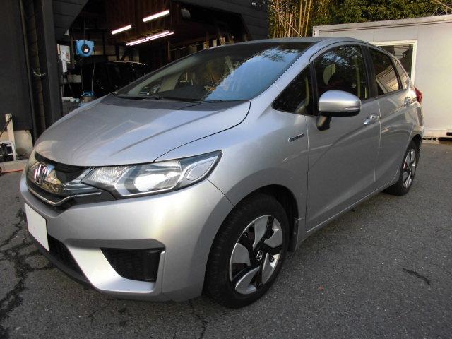 フィットハイブリッド Ｆパッケージ　ナビ　ＥＴＣ　プッシュスタート　フルフラット　安全ボディ　盗難警報装置　ＡＵＴＯエアコン　助手席エアバック　ＥＣＯＮ　ＡＢＳ付　横滑り防止システム　キーレスエントリー　運転席エアバック　パワーステアリング　パワーウィンドウ（6枚目）