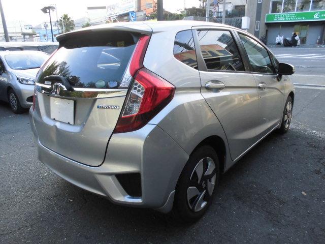 フィットハイブリッド Ｆパッケージ　ナビ　ＥＴＣ　プッシュスタート　フルフラット　安全ボディ　盗難警報装置　ＡＵＴＯエアコン　助手席エアバック　ＥＣＯＮ　ＡＢＳ付　横滑り防止システム　キーレスエントリー　運転席エアバック　パワーステアリング　パワーウィンドウ（14枚目）