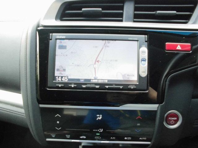 フィットハイブリッド Ｆパッケージ　ナビ　ＥＴＣ　プッシュスタート　フルフラット　安全ボディ　盗難警報装置　ＡＵＴＯエアコン　助手席エアバック　ＥＣＯＮ　ＡＢＳ付　横滑り防止システム　キーレスエントリー　運転席エアバック　パワーステアリング　パワーウィンドウ（29枚目）